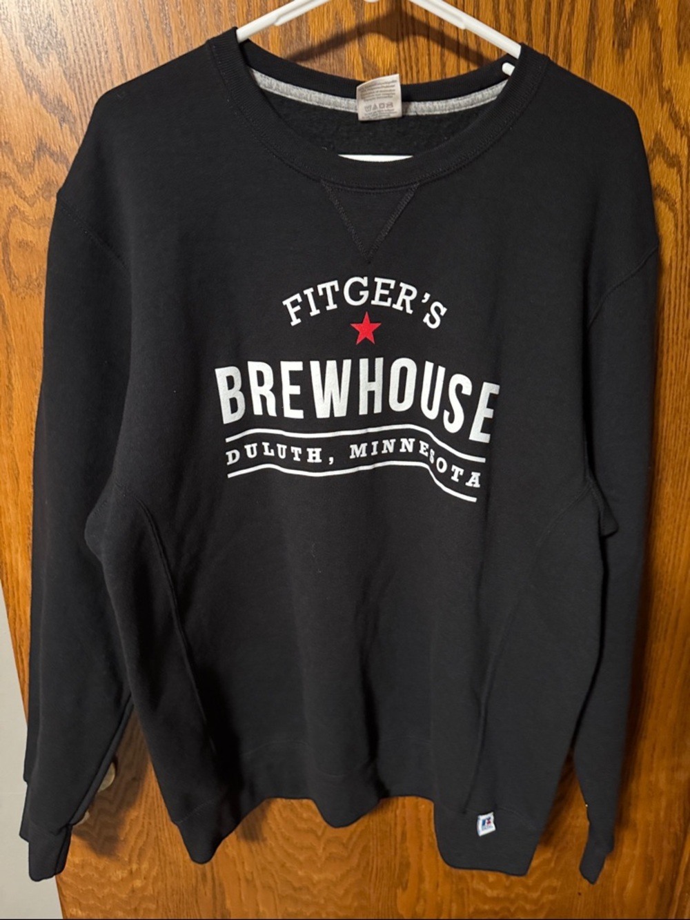 Russell Athletic Black Crewneck Sweatshirt with White Logo and Red Star